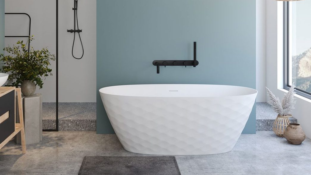 a white bathtub in a bathroom